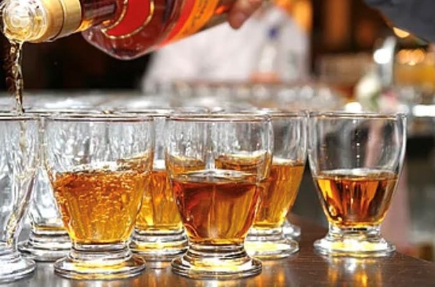 Two wine glasses next to each other